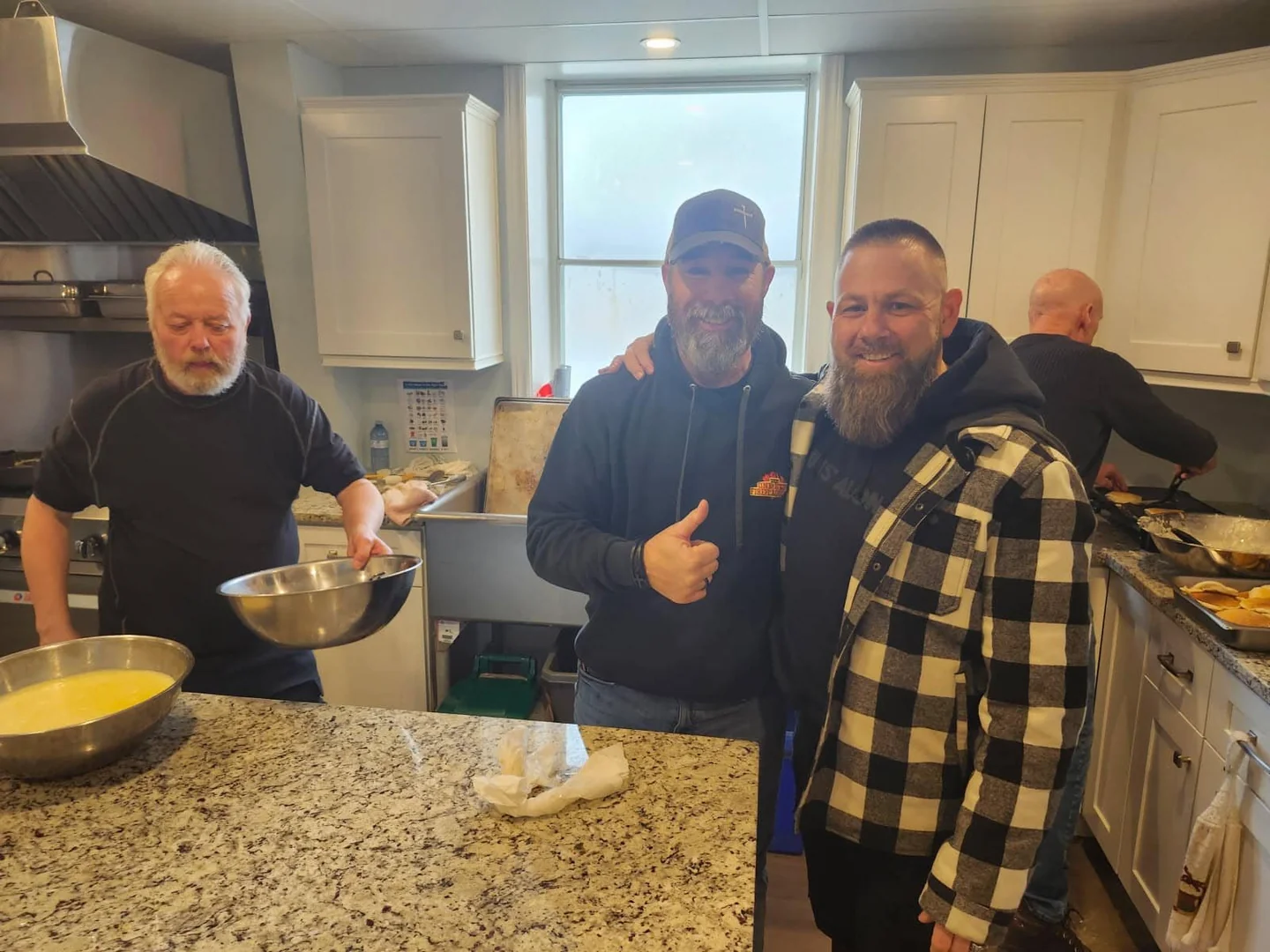 Preparing a meal together in the church kitchen.